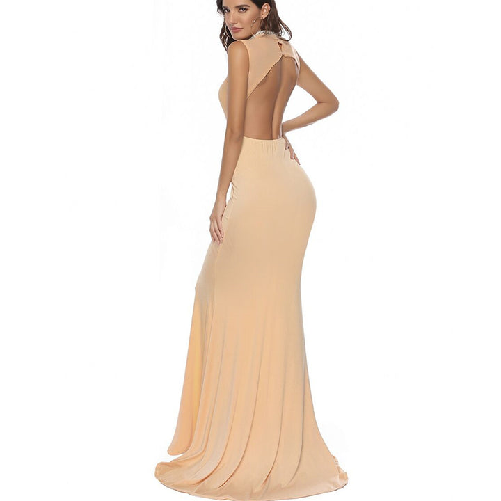 Ladies Elegant form-fitting maxi dress with deep slit and sparkling décolleté