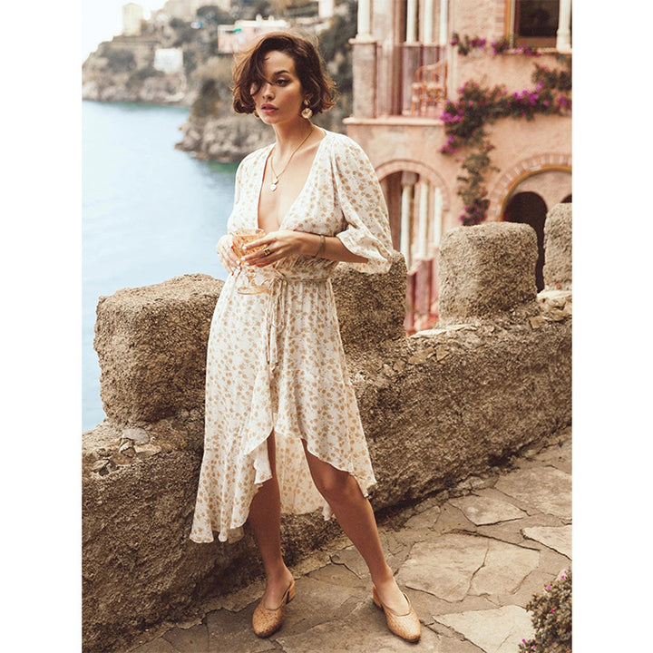 Women's maxi dress with deep V-neckline and playful floral print