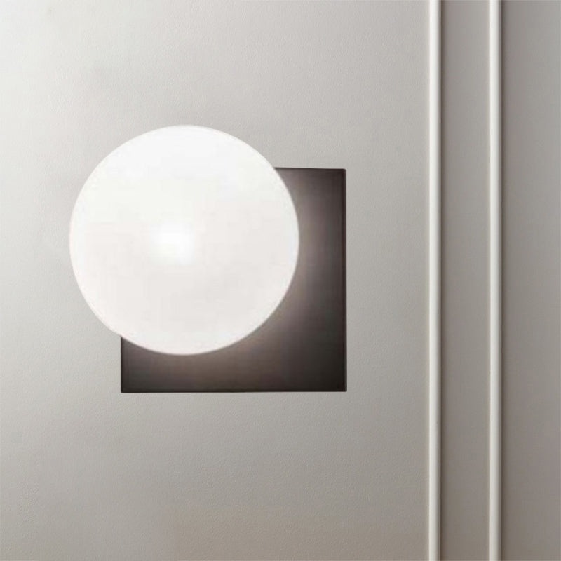 Skørter | Modern 1-Light Wall Lamp with White Glass Shade Black Round Wall-Mounted Light Fixture