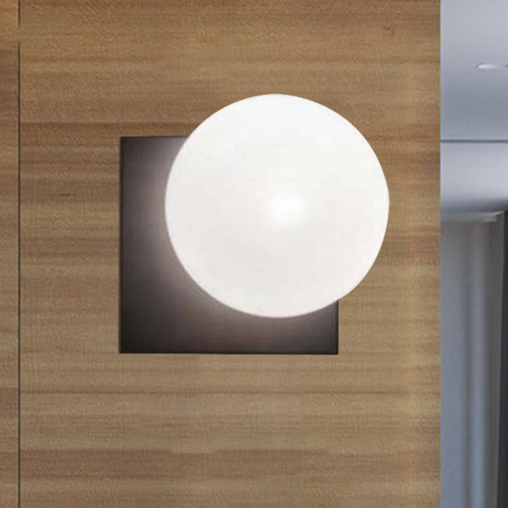 Skørter | Modern 1-Light Wall Lamp with White Glass Shade Black Round Wall-Mounted Light Fixture
