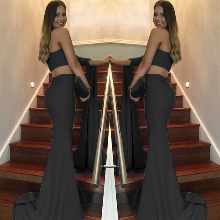 Women's elegant off-the-shoulder evening dress with asymmetric cut and flowing fabric