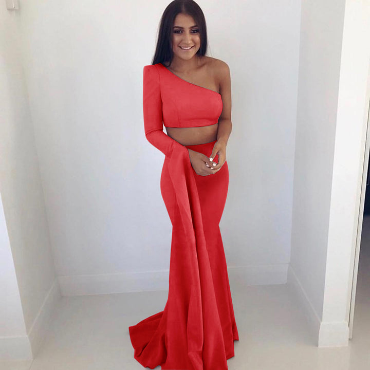 Women's elegant off-the-shoulder evening dress with asymmetric cut and flowing fabric
