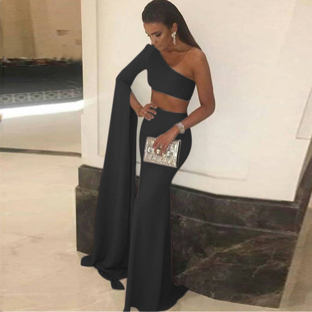 Women's elegant off-the-shoulder evening dress with asymmetric cut and flowing fabric