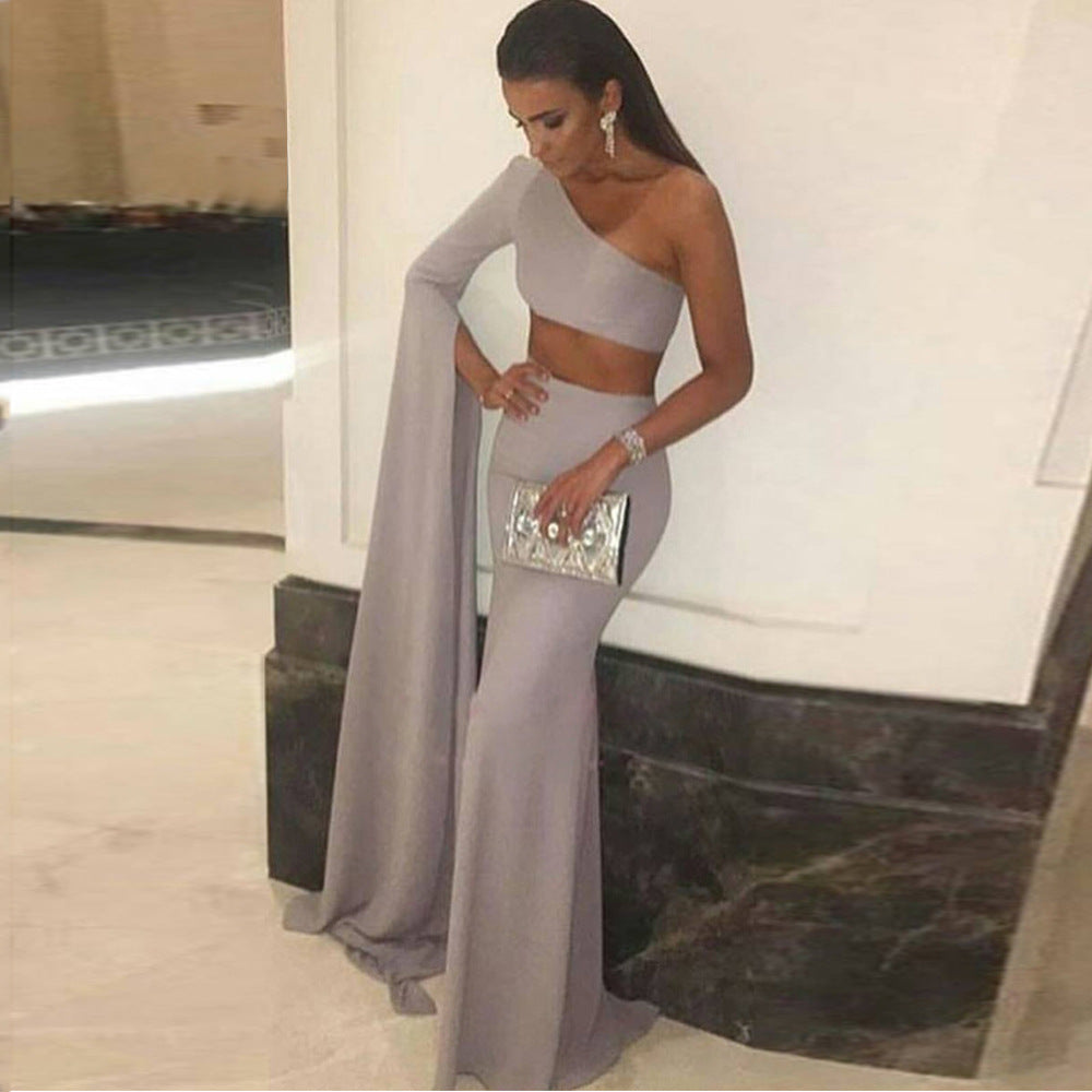 Women's elegant off-the-shoulder evening dress with asymmetric cut and flowing fabric