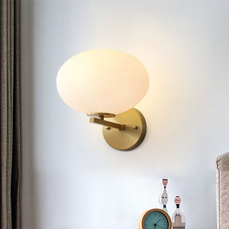 Skørter | Milk Glass Oval Wall Lamp Modern 1 Light Bedside Wall Sconce Light in Brass