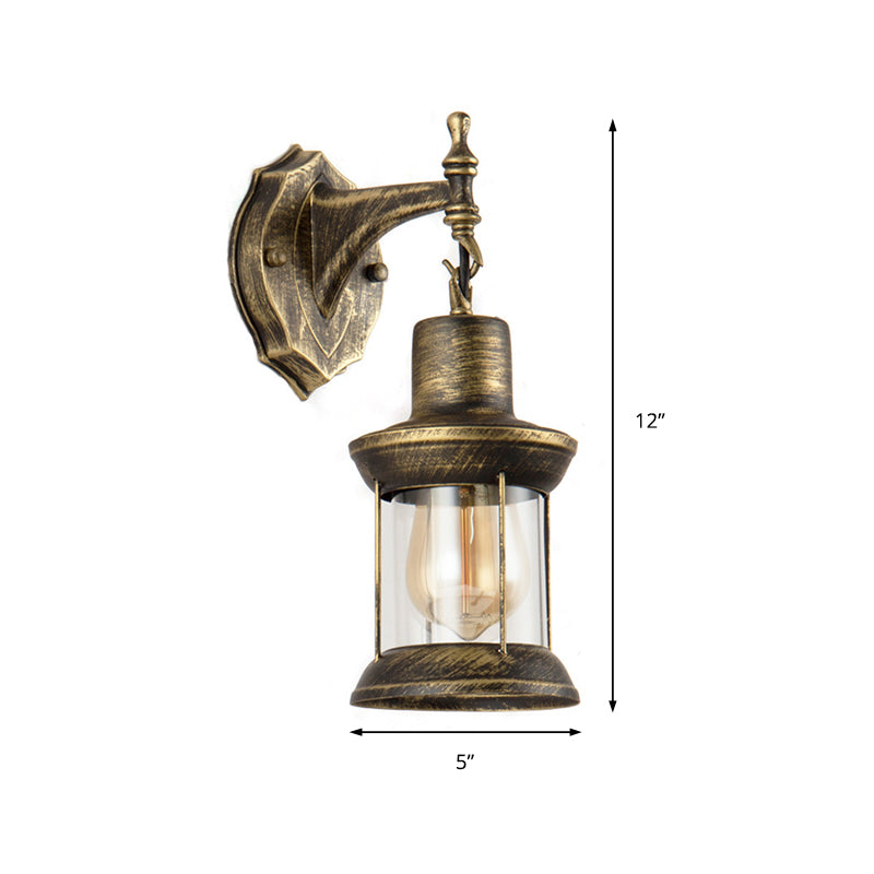 Lisslune | An E27 wall light with a petroleum shade made of clear glass Traditional outdoor wall light in antique bronze