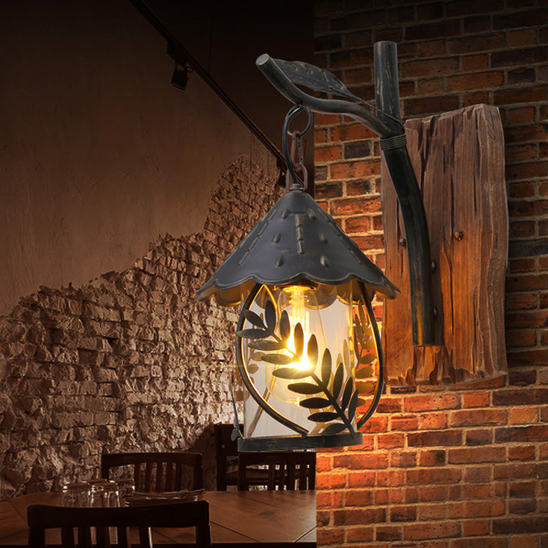 Lisslune | A wall lamp with a glass bulb and cylindrical shade made of clear glass, industrial wall lamp for the living room with leaf branch in black