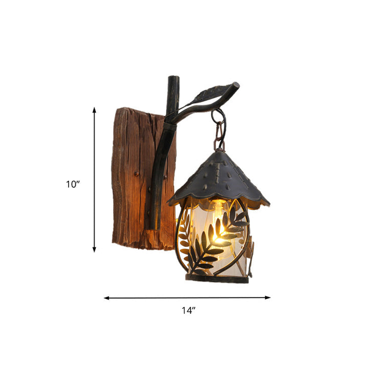 Lisslune | A wall lamp with a glass bulb and cylindrical shade made of clear glass, industrial wall lamp for the living room with leaf branch in black