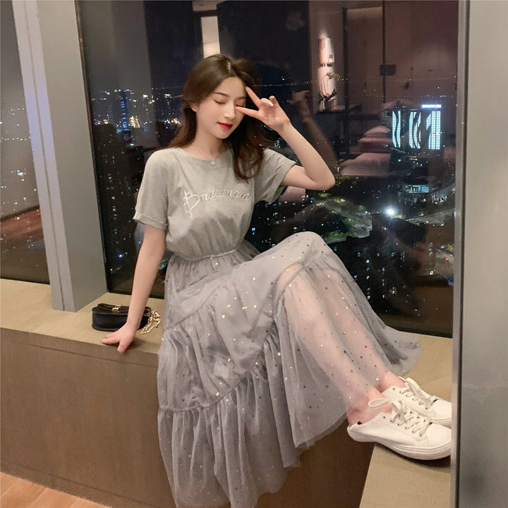Women's long dress with decorative tulle layers and elastic waistband