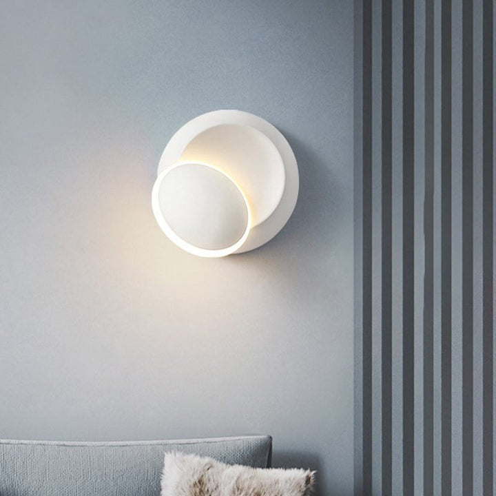 Lisslune | Black/White Rotating Ellipse Wall Light Modern Novelty Iron LED Surface Wall Sconce with Simulated Eclipse Design