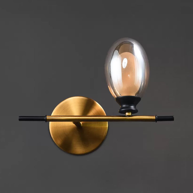 Lisslune | Brass straight bar wall light Mid Century 1 head metal wall light ideas with dual oval clear/amber glass shade