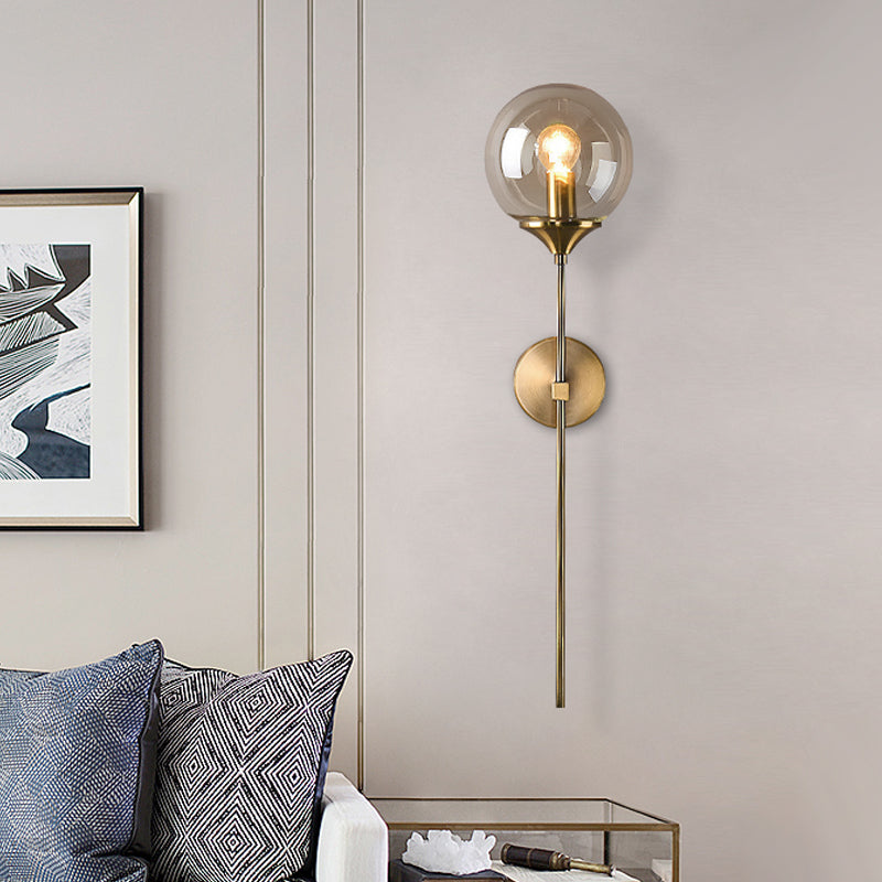 Lisslune | Simple wall lamp with a single bulb made of amber/smoke gray glass brass ball wall light fixture