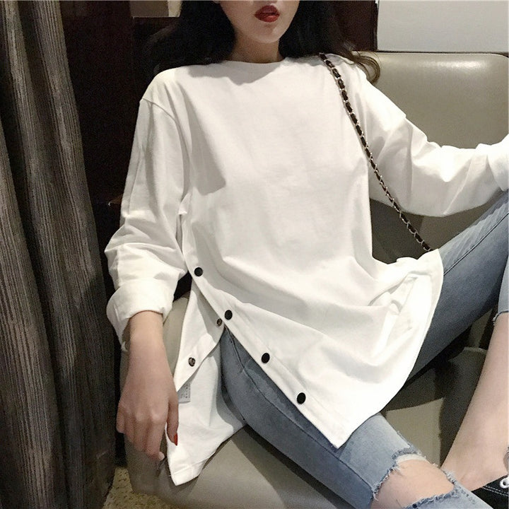 Women's long sleeve shirt with asymmetrical cut and decorative buttons