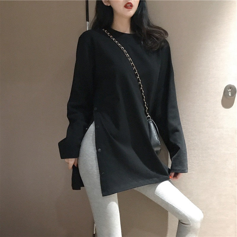 Women's long sleeve shirt with asymmetrical cut and decorative buttons