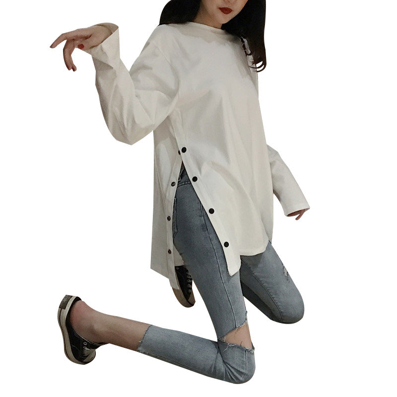 Women's long sleeve shirt with asymmetrical cut and decorative buttons