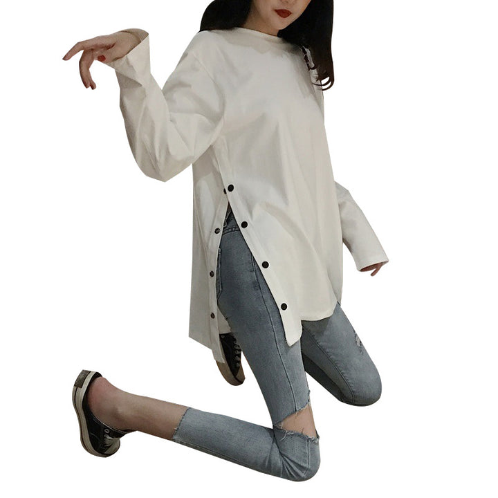 Women's long sleeve shirt with asymmetrical cut and decorative buttons