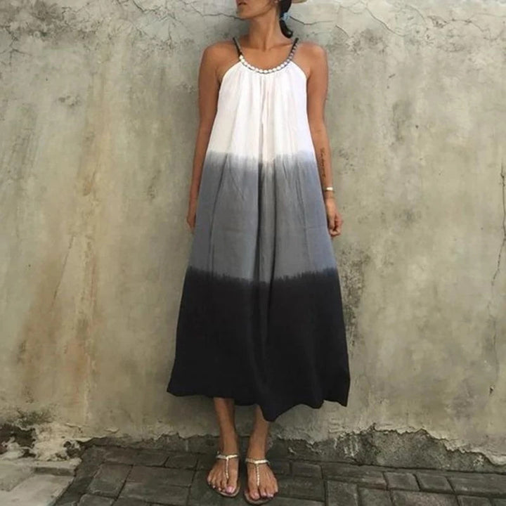 Women's maxi dress with pleated top and embellished straps
