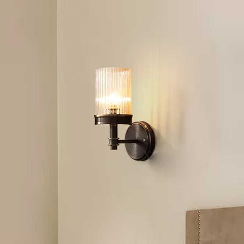 Skørter | 1-Light Wall Mount Lamp Traditional Cylinder Transparent Glass Wall Light in Brown/Gold above the Bed