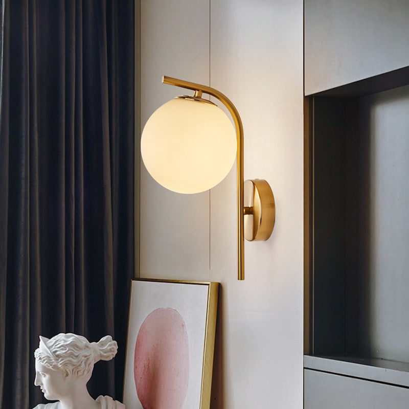 Lisslune | Postmodern Ball Wall Mount Light Gray/Clear Water/White Glass Single Bulb Nightstand Wall Lamp with Curved Arm in Brass