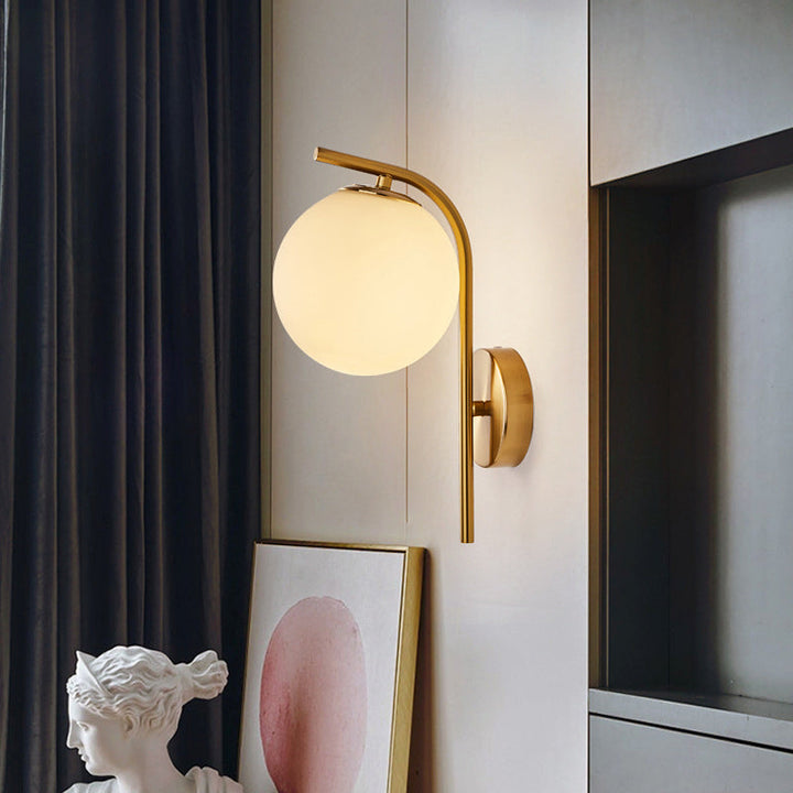 Lisslune | Postmodern Ball Wall Mount Light Gray/Clear Water/White Glass Single Bulb Nightstand Wall Lamp with Curved Arm in Brass