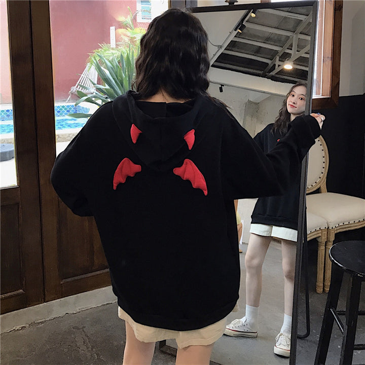 Women's oversized hoodie with playful wing appliqués Lisslune