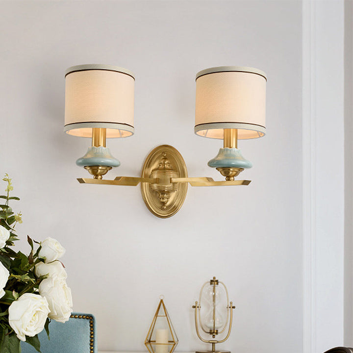 Skørter | Retro cylindrical wall lamp 1/2-light fabric wall lamp with porcelain shade in gold for porch