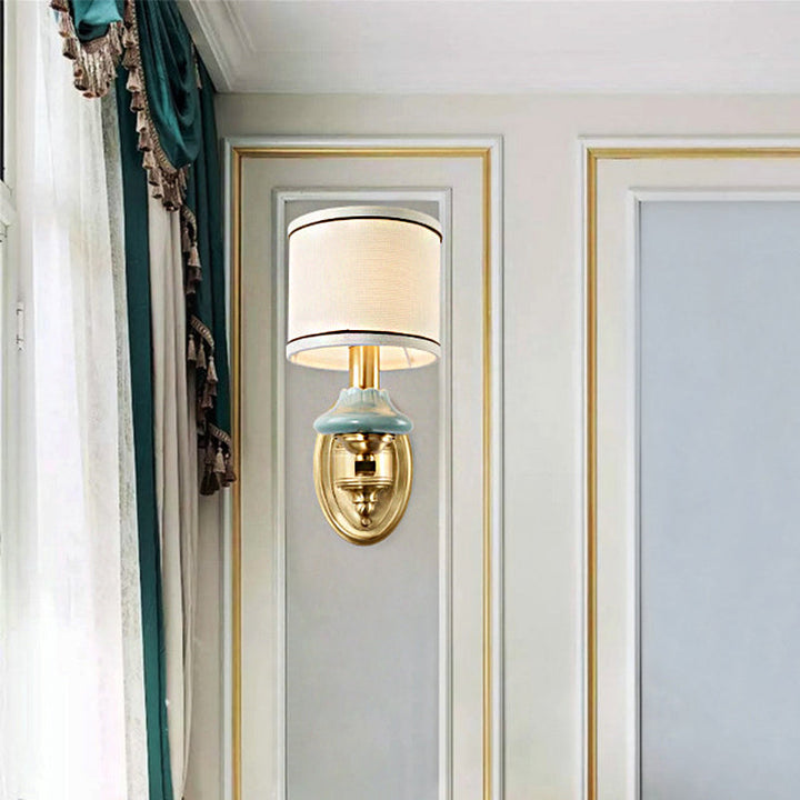 Skørter | Retro cylindrical wall lamp 1/2-light fabric wall lamp with porcelain shade in gold for porch