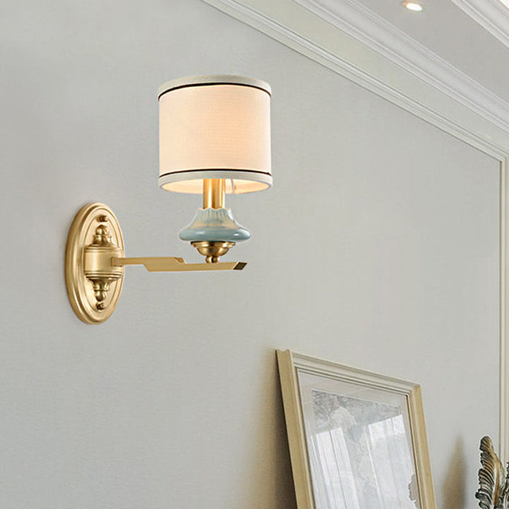 Skørter | Retro cylindrical wall lamp 1/2-light fabric wall lamp with porcelain shade in gold for porch