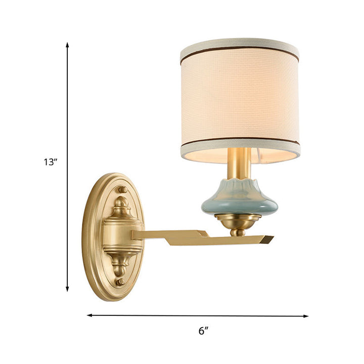 Skørter | Retro cylindrical wall lamp 1/2-light fabric wall lamp with porcelain shade in gold for porch