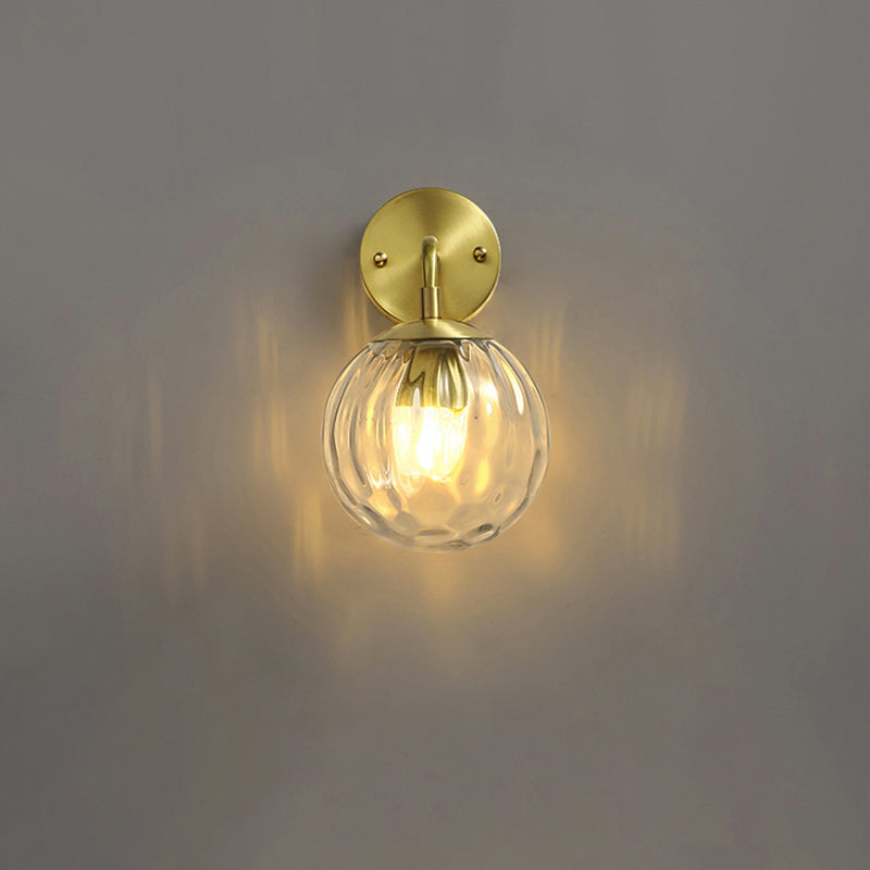 Skørter | Clear Ripple Glass Ball Wall Lamp Minimalistic 1-Light Brass Wall Lamp Fixture for Dining Room