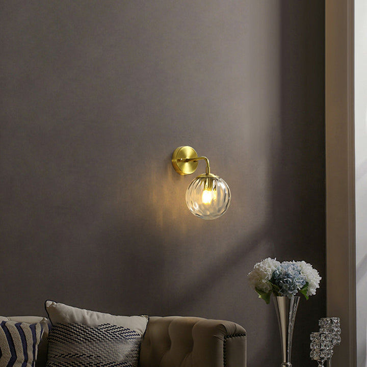 Skørter | Clear Ripple Glass Ball Wall Lamp Minimalistic 1-Light Brass Wall Lamp Fixture for Dining Room
