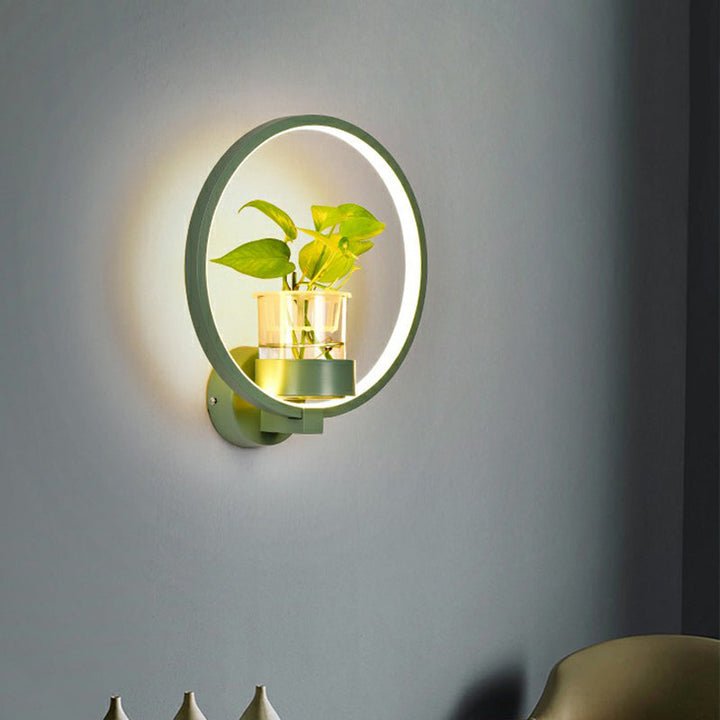 Skørter | Artistic Loop-shaped Wall Lamp Metal Nightstand Wall Light with Clear Glass Plant Pot