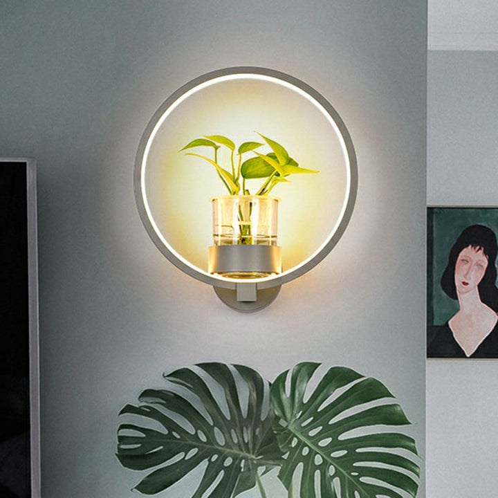 Skørter | Artistic Loop-shaped Wall Lamp Metal Nightstand Wall Light with Clear Glass Plant Pot