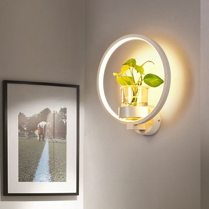 Skørter | Artistic Loop-shaped Wall Lamp Metal Nightstand Wall Light with Clear Glass Plant Pot
