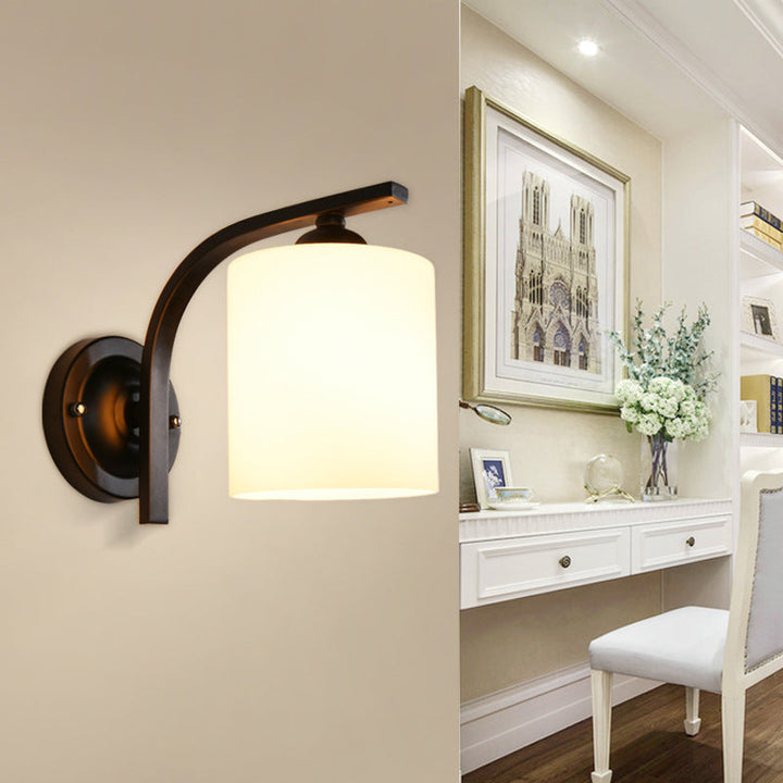 Skørter | Cylindrical white glass wall lamp Vintage 1 head corridor wall lamp with curved arm in black