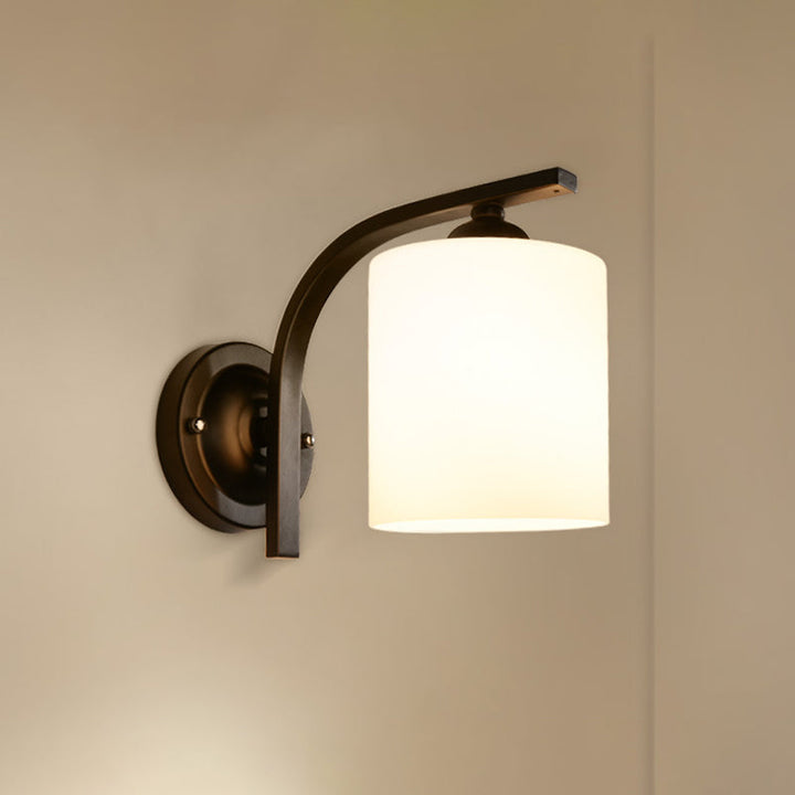 Skørter | Cylindrical white glass wall lamp Vintage 1 head corridor wall lamp with curved arm in black