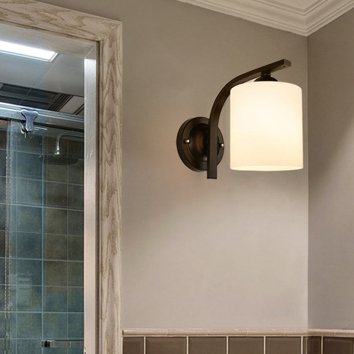 Skørter | Cylindrical white glass wall lamp Vintage 1 head corridor wall lamp with curved arm in black