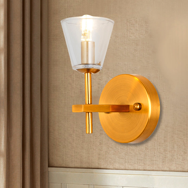Skørter | 1/2-Light Clear Glass Wall Lamp Modern Style Golden Cone Bedroom Wall Light with Sleek Arm