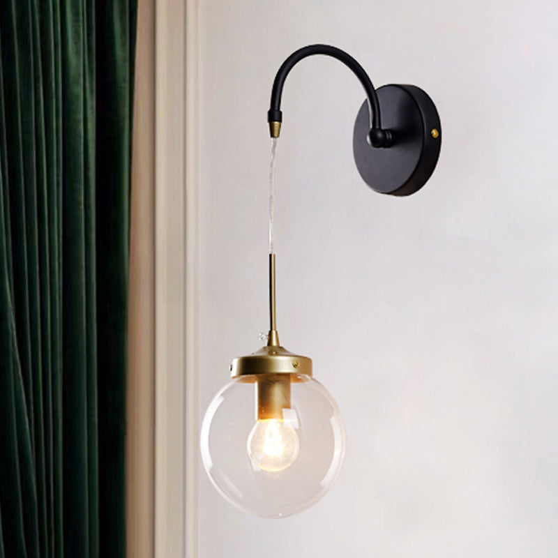 Skørter | 1-Light Clear Glass Wall Sconce Traditional Black Globe Shade Dining Room Sconce Light with Curved Arm