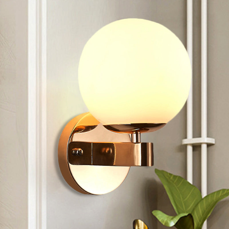 Skørter | Single bulb wall light with spherical opaline glass vintage style bedroom wall light in chrome/gold