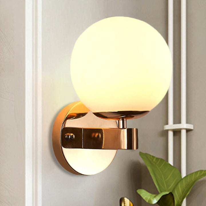 Skørter | Single bulb wall light with spherical opaline glass vintage style bedroom wall light in chrome/gold