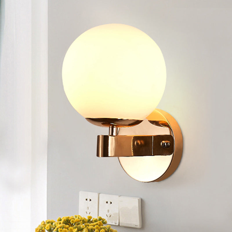 Skørter | Single bulb wall light with spherical opaline glass vintage style bedroom wall light in chrome/gold