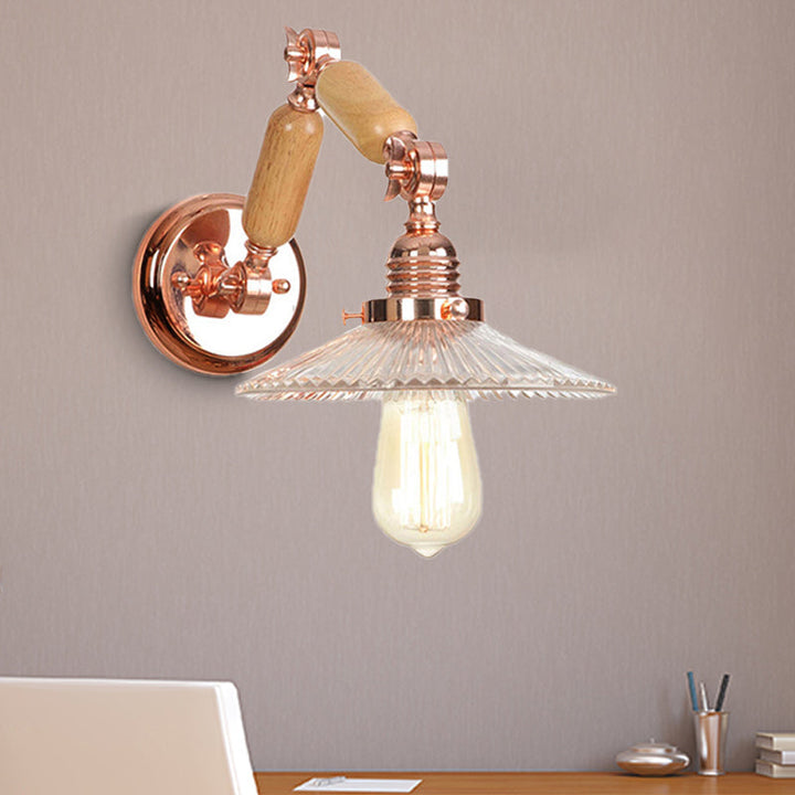 Lisslune | A wall light with a light bulb and conical shade made of clear prismatic glass, industrial wall lamp for the living room with curved arm