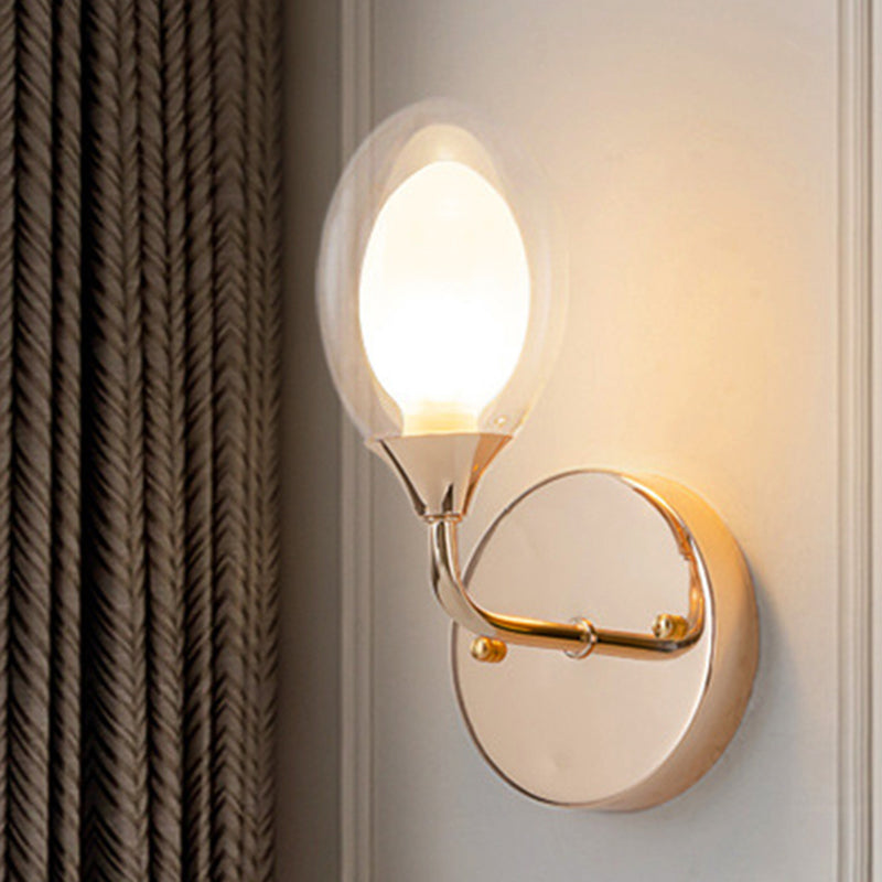 Lisslune | Modern oval shadow wall lighting 1 lamp clear glass wall lamp in brass for the dining room