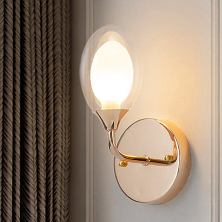 Lisslune | Modern oval shadow wall lighting 1 lamp clear glass wall lamp in brass for the dining room