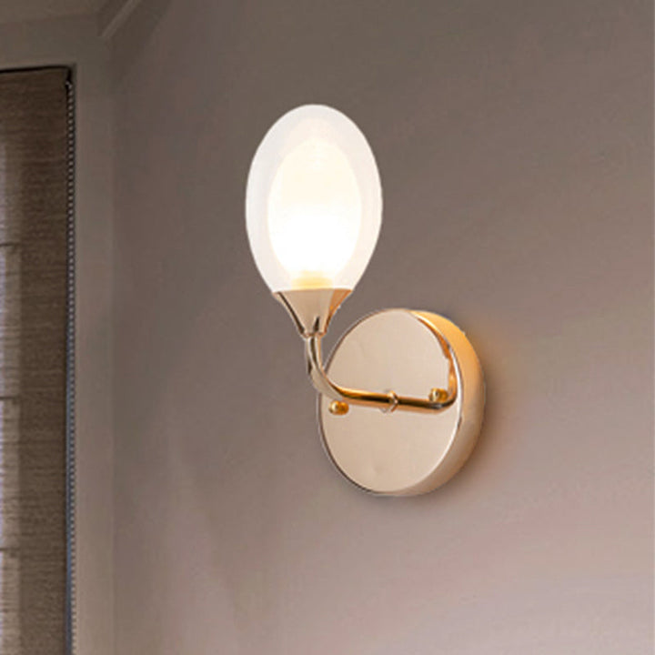 Lisslune | Modern oval shadow wall lighting 1 lamp clear glass wall lamp in brass for the dining room