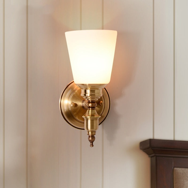 Skørter | 1-Head Wall Light with Cone Shade White Glass Modernist Style Bedroom Wall Light in Gold