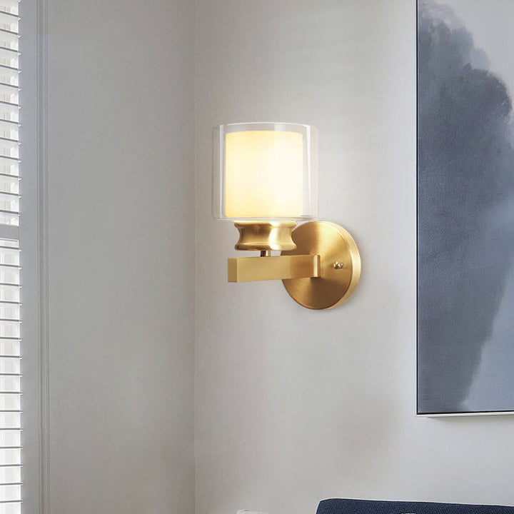 Skørter | Modern Style Cylindrical Wall Light 1 Light Clear and White Glass Wall Mount Lamp in Brass for Bedroom