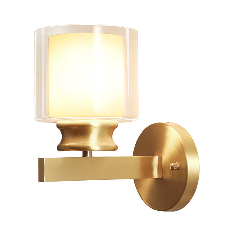 Skørter | Modern Style Cylindrical Wall Light 1 Light Clear and White Glass Wall Mount Lamp in Brass for Bedroom