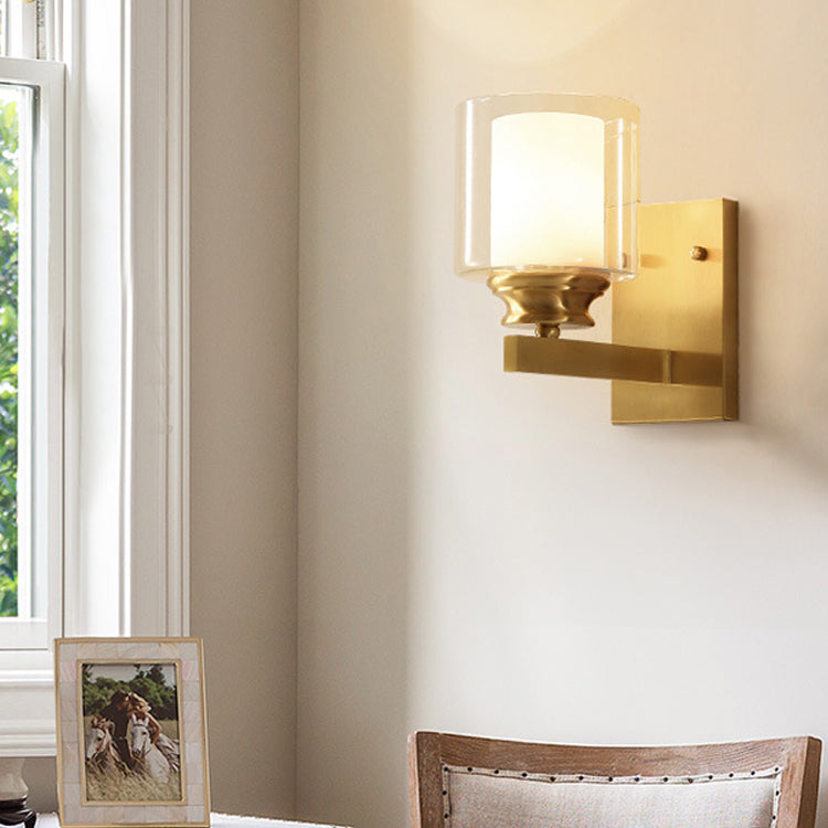 Skørter | Clear Glass Drum Wall Mounted Light Modern Style 1 Head Dining Room Wall Lighting in Brass
